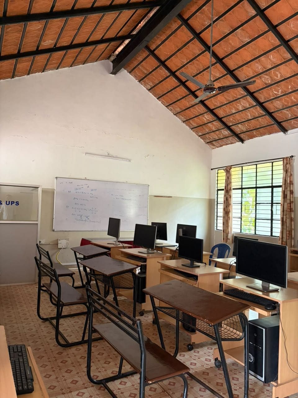 The computer laboratory at Mandaara Public School, with desktop computers at individual workstations.